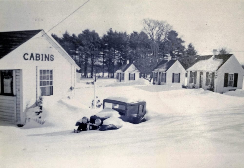 New England Village cabins covered in snow